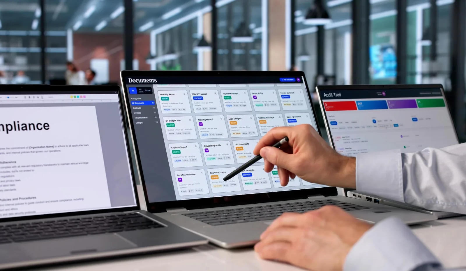 Compliance and audit tracking dashboards displayed across multiple screens